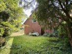 RUDNICK bietet 3x MEHR – Dreifamilienhaus auf großem Grundstück in Kolenfeld - Gartenansicht
