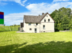 RUDNICK bietet: PROVISIONSFREI FÜR DEN KÄUFER ! 2 Familienhaus mit riesigem Garten / Baugrundstück - Ansicht von der Seite_