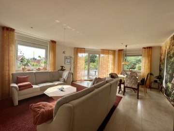 RUDNICK bietet vermietete 3-Zimmer-Eigentumswohnung mit Garage und Balkon, 31515 Wunstorf, Etagenwohnung