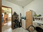 RUDNICK bietet vermietete 3-Zimmer-Eigentumswohnung mit Garage und Balkon - Hauswirtschaftsraum