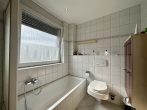 RUDNICK bietet vermietete 3-Zimmer-Eigentumswohnung mit Garage und Balkon - Bad