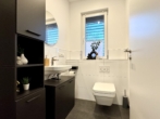 RUDNICK bietet exklusives Penthouse in einzigartiger & ruhiger Feldrandlage - Gäste-WC