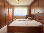 RUDNICK bietet ZUKUNFT – Bungalow mit Garten für Familien & Paare in Luthe - Schlafzimmer
