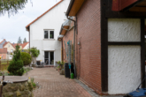 RUDNICK bietet: Solide Kapitalanlage mit Entwicklungspotenzial: Mehrfamilienhaus mit 4 Wohneinheiten - Terrasse