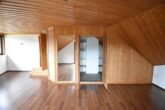RUDNICK bietet vermietetes DOPPELHAUS + BAUGRUNDSTÜCK in Klein Heidorn - Schlafzimmer mit Ankleide (Haus 2)