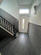 RUDNICK bietet gut geschnittene 3-Zimmer-Wohnung fußläufig von Wunstorf's Innenstadt - Treppenhaus