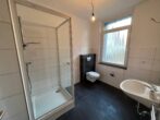 RUDNICK bietet gut geschnittene 3-Zimmer-Wohnung fußläufig von Wunstorf's Innenstadt - Badezimmer