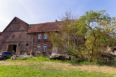 RUDNICK bietet: Charmantes Bauernhaus mit Geschichte und Potenzial - Außenansicht Anbau