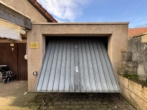 RUDNICK bietet VIELFALT & SUBSTANZ – Mehrfamilienhaus mit Garten und Perspektive - Garage 1
