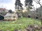 RUDNICK bietet LAGE, LAGE, LAGE: großzügiger Bungalow in zentraler Lage von Wunstorf - Gartenansicht