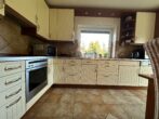 RUDNICK bietet FAMILIENGLÜCK - Einfamilienhaus in ruhiger Lage von Helmste - Küche im Landhausstil