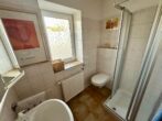 RUDNICK bietet FAMILIENGLÜCK - Einfamilienhaus in ruhiger Lage von Helmste - Gäste-Bad im EG