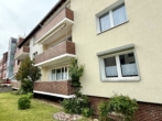 RUDNICK bietet WOHNGLÜCK: Attraktive 3-Zimmer-Hochparterrewohnung mit Balkon und Garage in Gehrden - Außenansicht